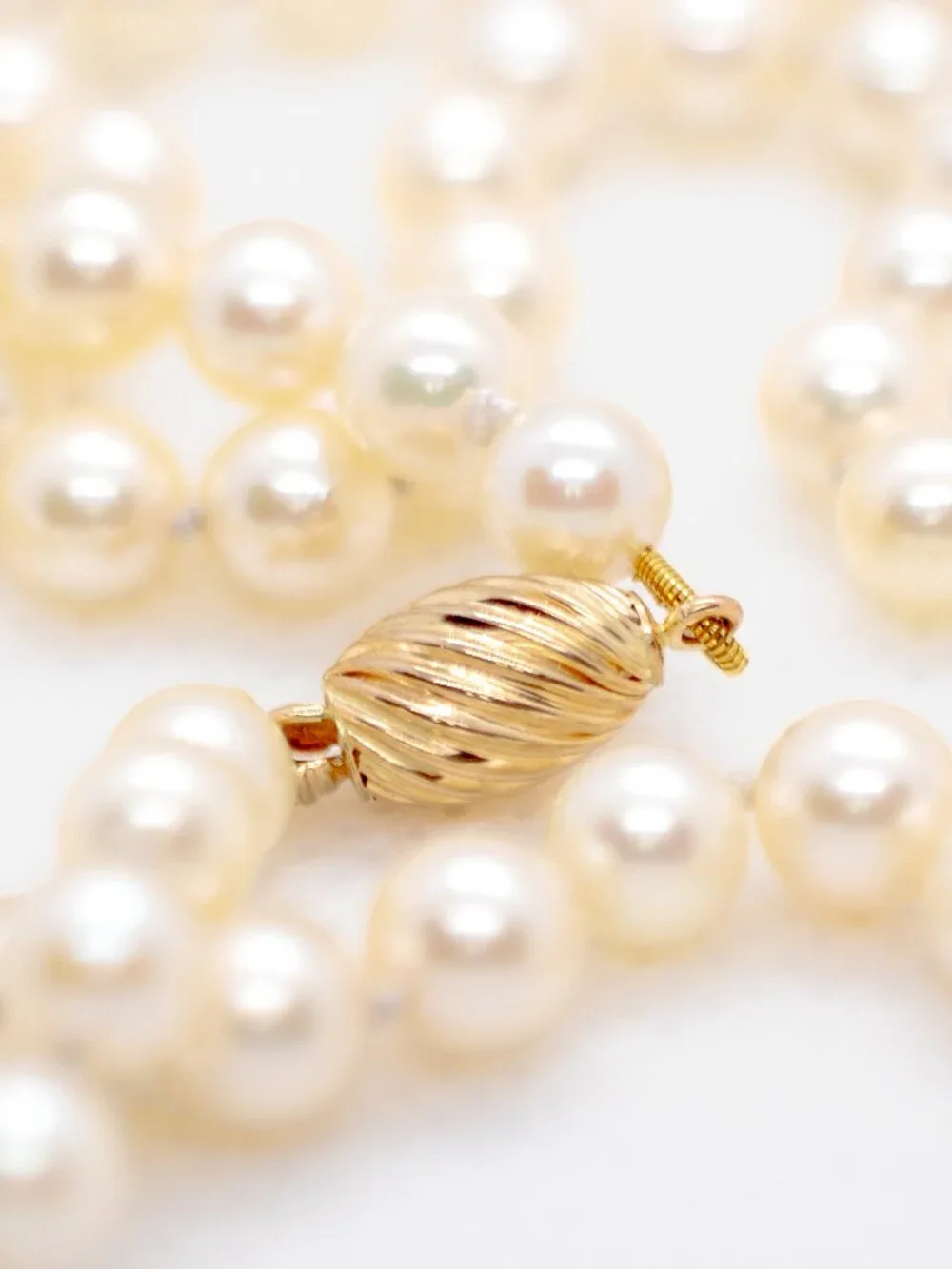 Timeless Vintage Matinee-length Akoya Pearls with 14k Gold Clasp